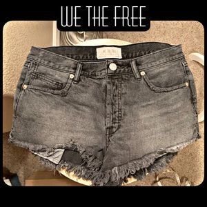 Distressed cut offs by We the Free (Free People)
